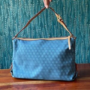 Dooney & Bourke vintage Signature Blue Purse with Tan Leather strap and details.